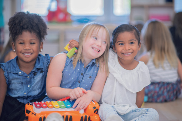 Group of three girls playing